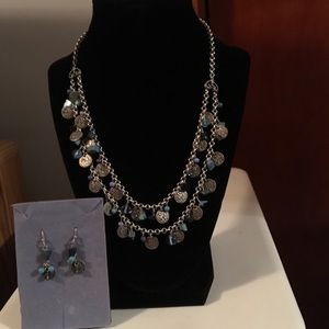 Boho style silver coin necklace with blue stones